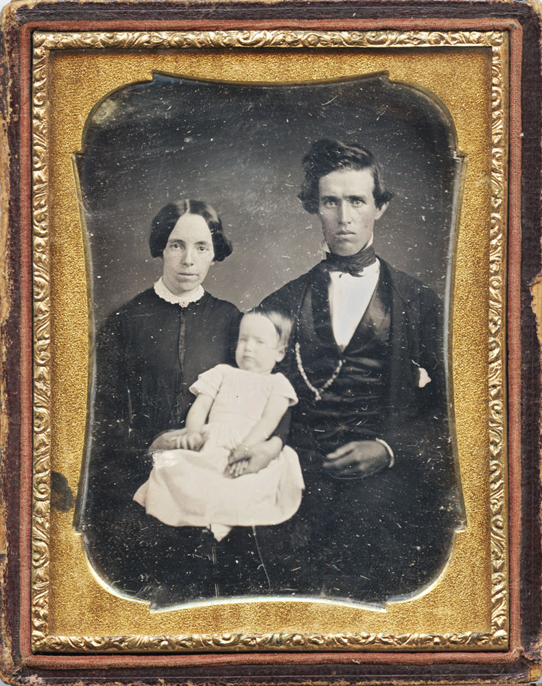 (image for) Quarter plate of a couple both holding a baby.