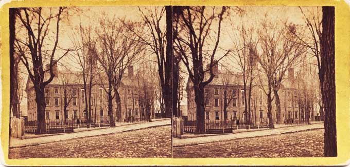 School building, unidentified.Yellow flat mount, c. 1860s.
